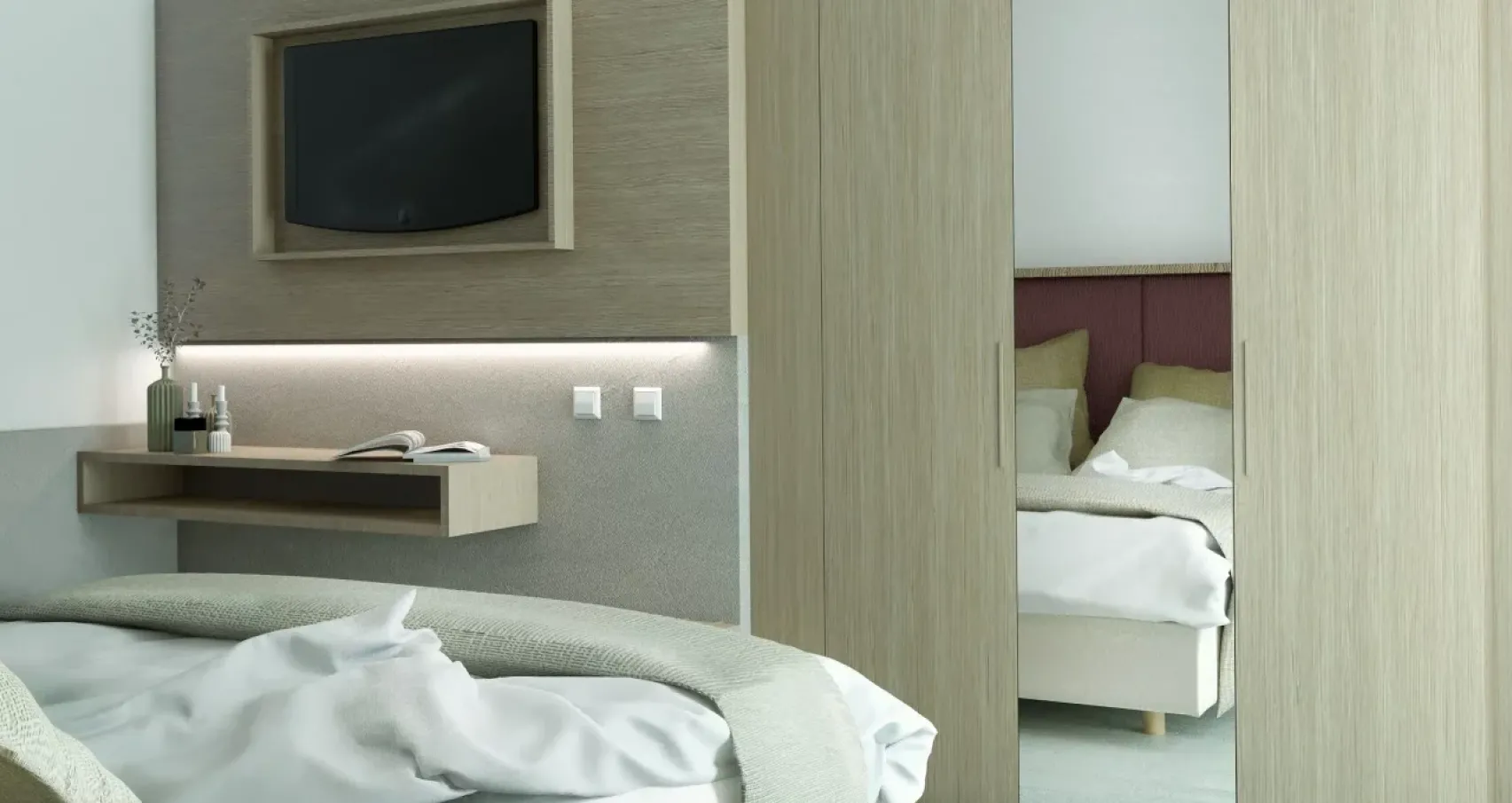 Modern room with bed, wardrobe, and wall-mounted TV.